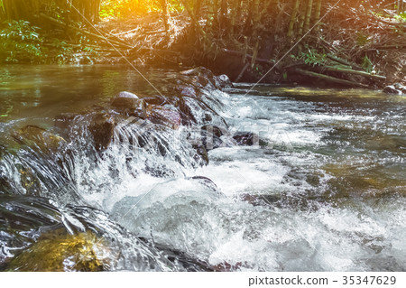 Waterfall river flow. Serenity nature background. 35347629