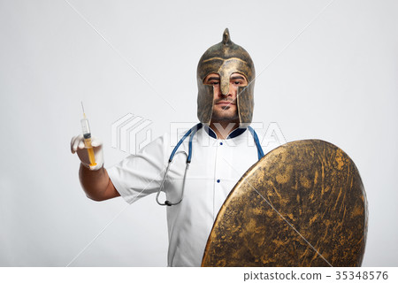 Male doctor wearing medieval armor 35348576
