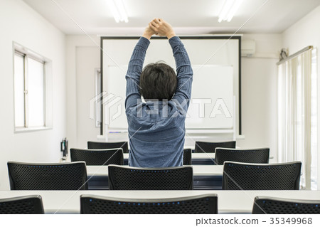Men doing stretching in the classroom 35349968