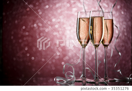 Picture of three wine glasses with champagne on Picture of three wine glasses with champagne on 35351276