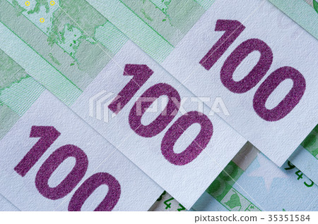 Heap of One hundred Euro currency banknotes. Heap of One hundred Euro currency banknotes. 35351584