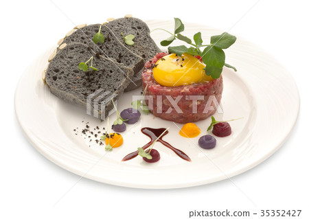 Tartar with black bread and yolk, isolate Tartar with black bread and yolk, isolate 35352427