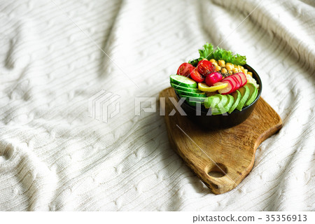 Buddha bowl with avocado, quinoa, cucumber, radish 35356913