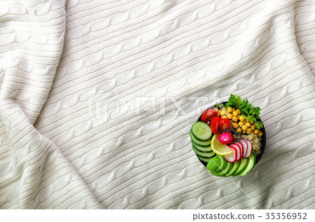 Buddha bowl with avocado, quinoa, cucumber, radish 35356952