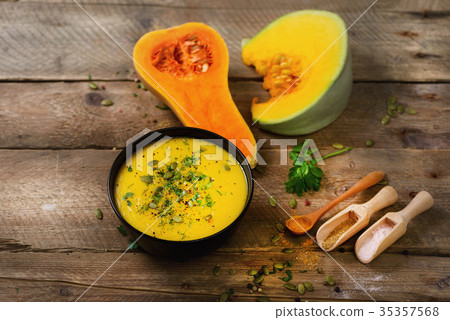 Vegetable and lentils creamy soup, cut pumpkin 35357568