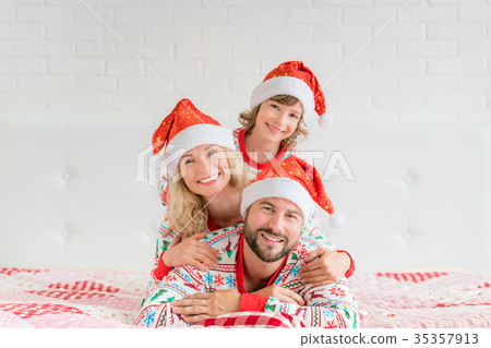 Happy family in Christmas eve Happy family in Christmas eve 35357913