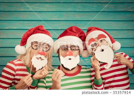 Happy family on Christmas eve Happy family on Christmas eve 35357914