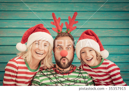 Happy family on Christmas eve Happy family on Christmas eve 35357915