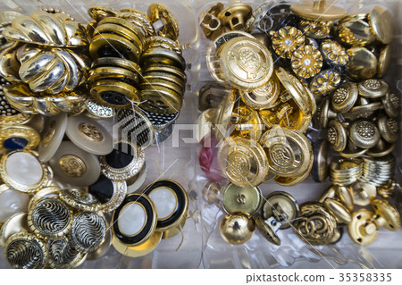 Collection of gold, silver and metal buttons 35358335