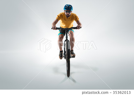 The bicyclist on gray, studio shot. 35362013
