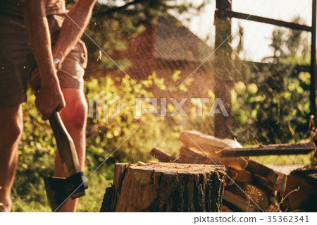 a guy chopping wood 35362341
