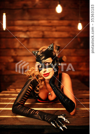 Alluring model in leather costume Alluring model in leather costume 35363183