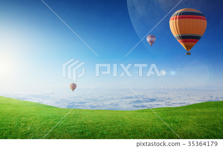 Rising hot air balloons in clear blue sky 35364179