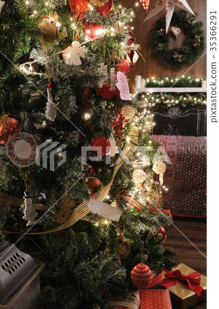 Christmas tree, bed and fireplace. 35366291