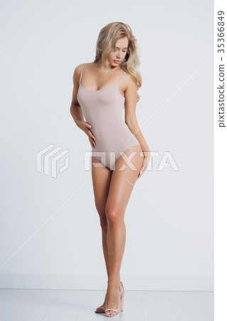 young blonde girl shows her emotions in the Studio 35366849