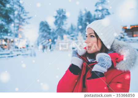 Happy woman in a snow landscape 35366850