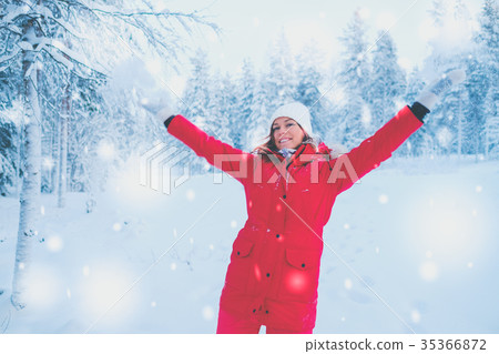 Happy woman in a snow landscape Happy woman in a snow landscape 35366872