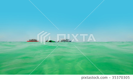 Low position sea view with ship and tourist 35370305