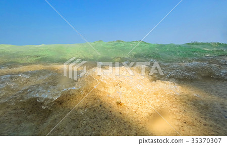 Sea wave splashing Sea wave splashing 35370307