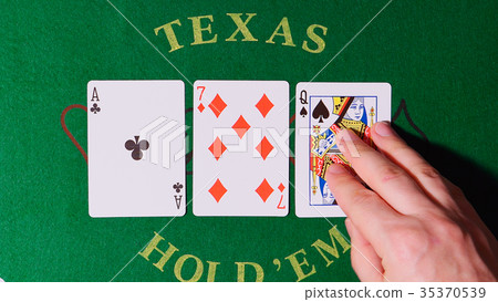 POKER: Dealers hands out cards on a table 35370539