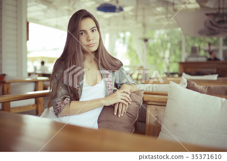 Summer portrait of a young adult beautiful girl Summer portrait of a young adult beautiful girl 35371610