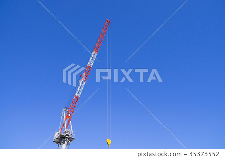 Blue sky bred by crane at construction site b 35373552