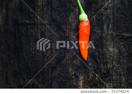 colorful of chilli on dark wood colorful of chilli on dark wood 35374014