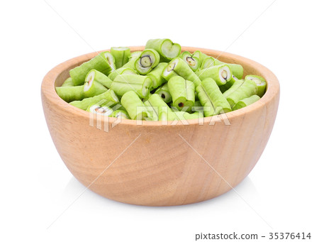 front view of slice yard long bean in wooden bowl  35376414