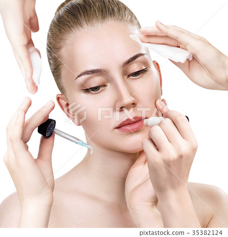 Woman surrounded by cosmetics devices. Woman surrounded by cosmetics devices. 35382124