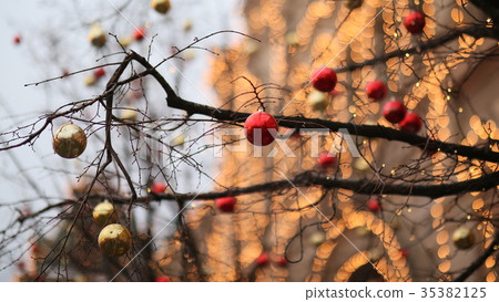 Streets fully decorated for Christmas with red and 35382125