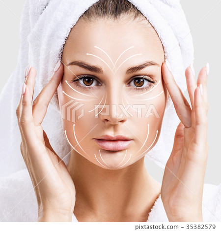 Massage lines on beautiful woman's face. Massage lines on beautiful woman's face. 35382579