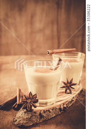 Traditional Eggnog Cocktail for Christmas Eve. Traditional Eggnog Cocktail for Christmas Eve. 35386222
