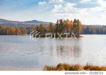 Autumn landscape with a reflection in the lake Autumn landscape with a reflection in the lake 35386721