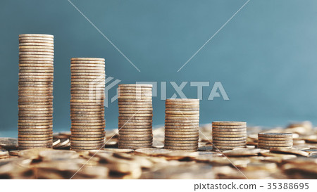 Stacks of golden coins. 35388695