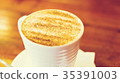 cappuccino cup on the brown wooden table 35391003