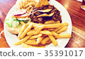 Unhealthy meal with mexican nacho chips loaded 35391017