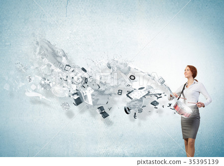 Businesswoman playing drums Businesswoman playing drums 35395139