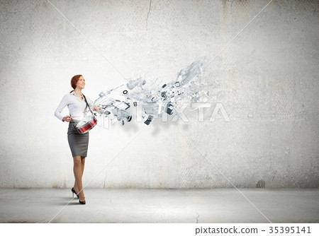 Businesswoman playing drums Businesswoman playing drums 35395141