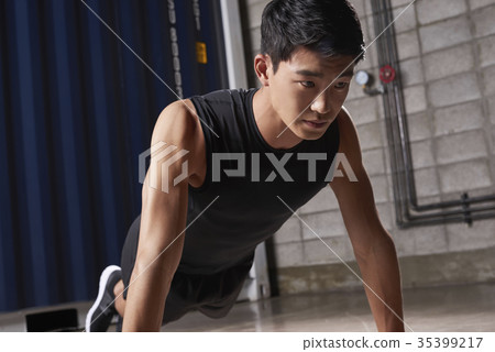 Young man, stretching Young man, stretching 35399217