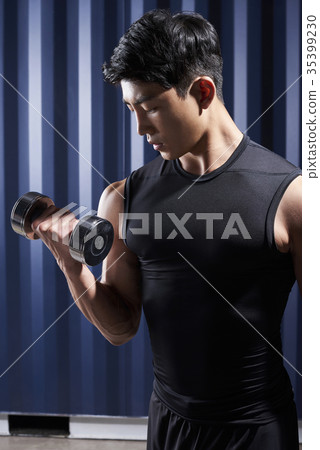 Young man, dumbbell 35399230