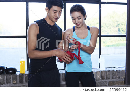 Young man, young woman, boxing 35399412