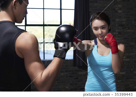 Young man, young woman, boxing 35399443