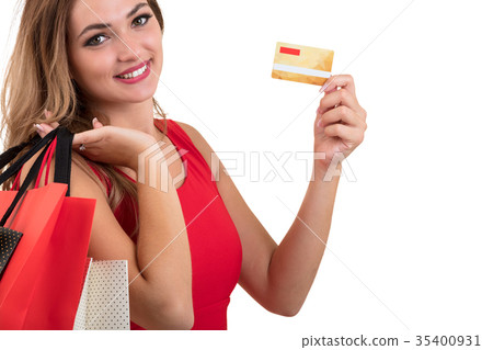 Cheerful excited surprised young woman with credit Cheerful excited surprised young woman with credit 35400931