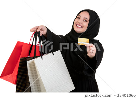 Happy of standing muslim woman with shopping bag Happy of standing muslim woman with shopping bag 35401060