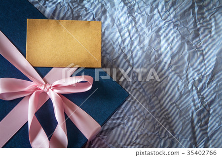 Dark blue gift box with  ribbon decoration 35402766