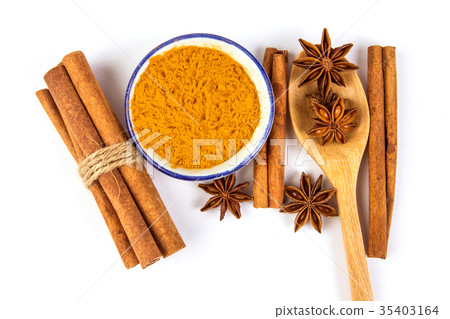Close up the brown cinnamon stick and powder  35403164