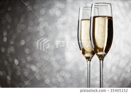 Festive picture of two wine glasses with sparkling 35405152