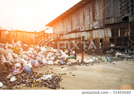 glass bottle in garbage for recycle 35405680