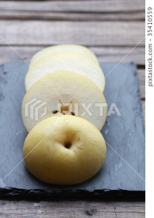 Sliced 20th Century Pear 35410559