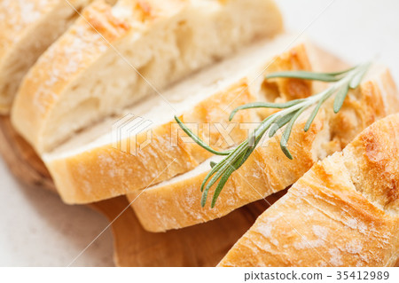 Fresh ciabatta on a light background 35412989